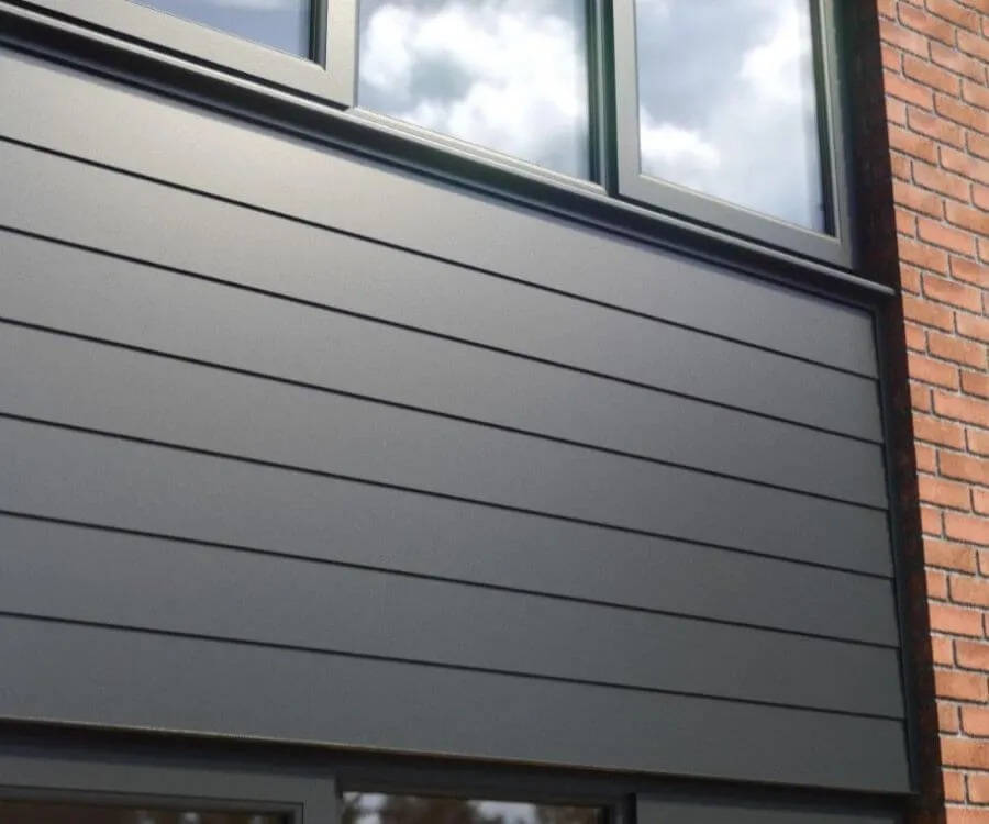 Horizontal cladding boards in a dark grey finish, shown on an external wall