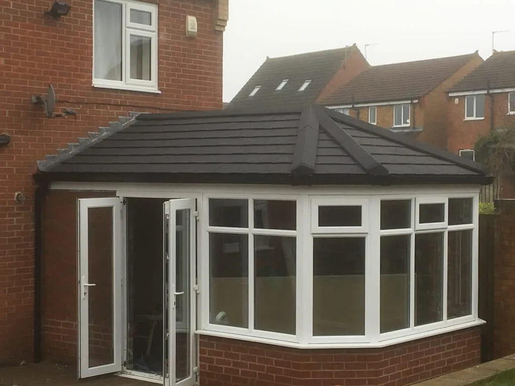 Conservatory in Coxhoe, County Durham fitted with a replacement solid tiled conservatory roof.