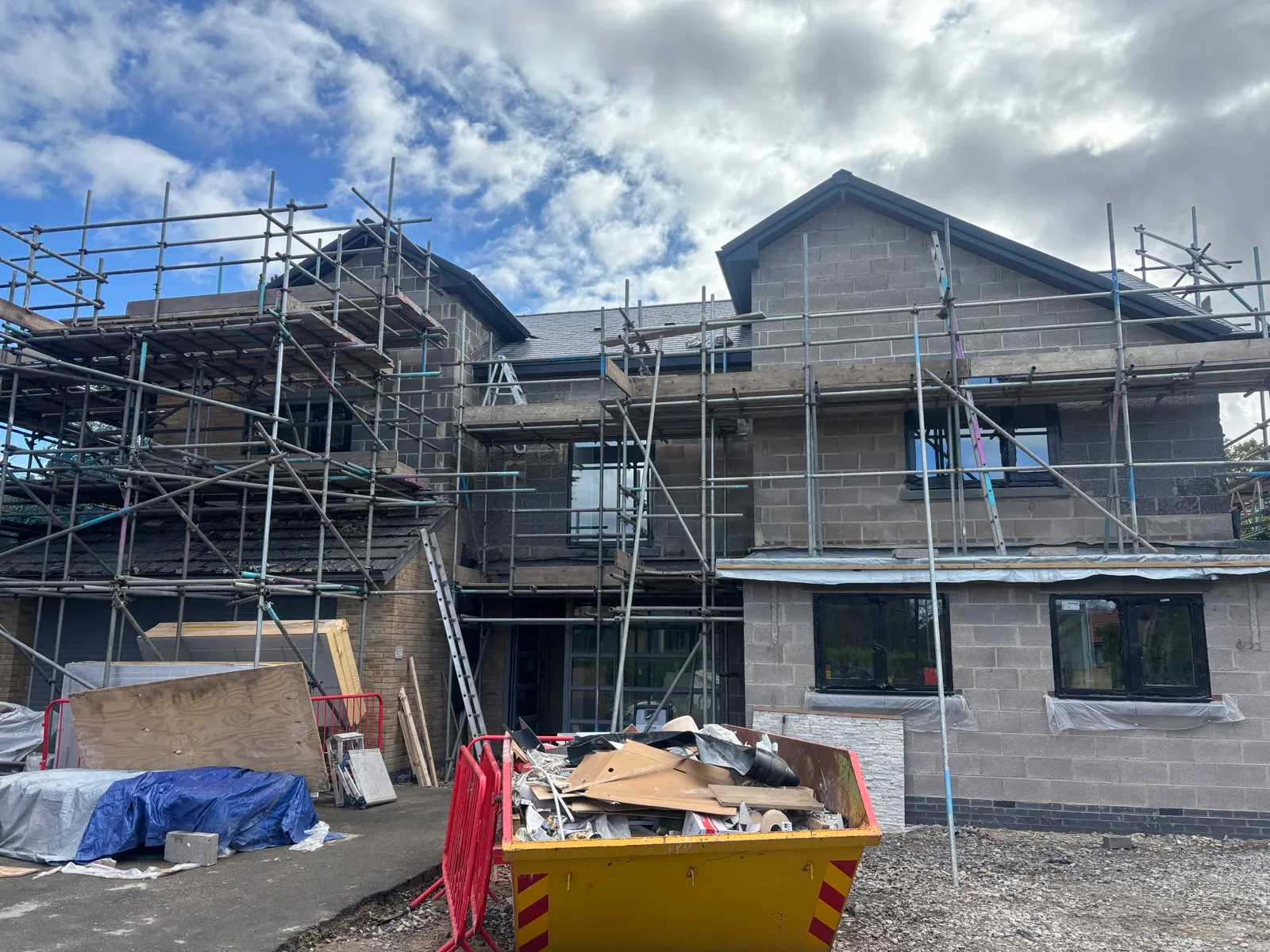 The property during wider building works, with scaffolding in place.