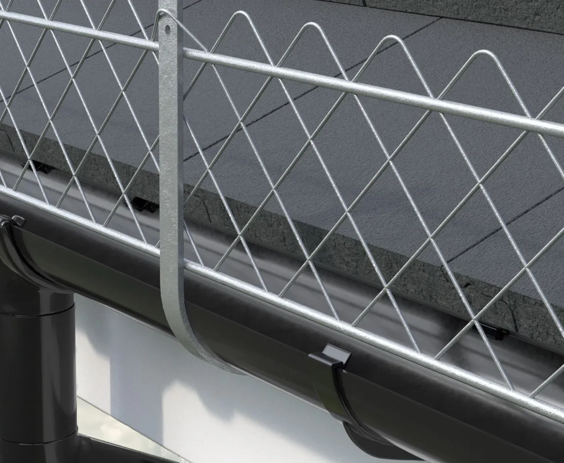 Lattice snow guard fixed above the gutter along the roof edge