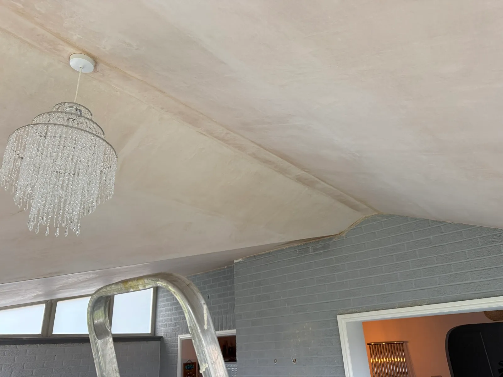 Plastered ceiling across the connected sections, before decoration.