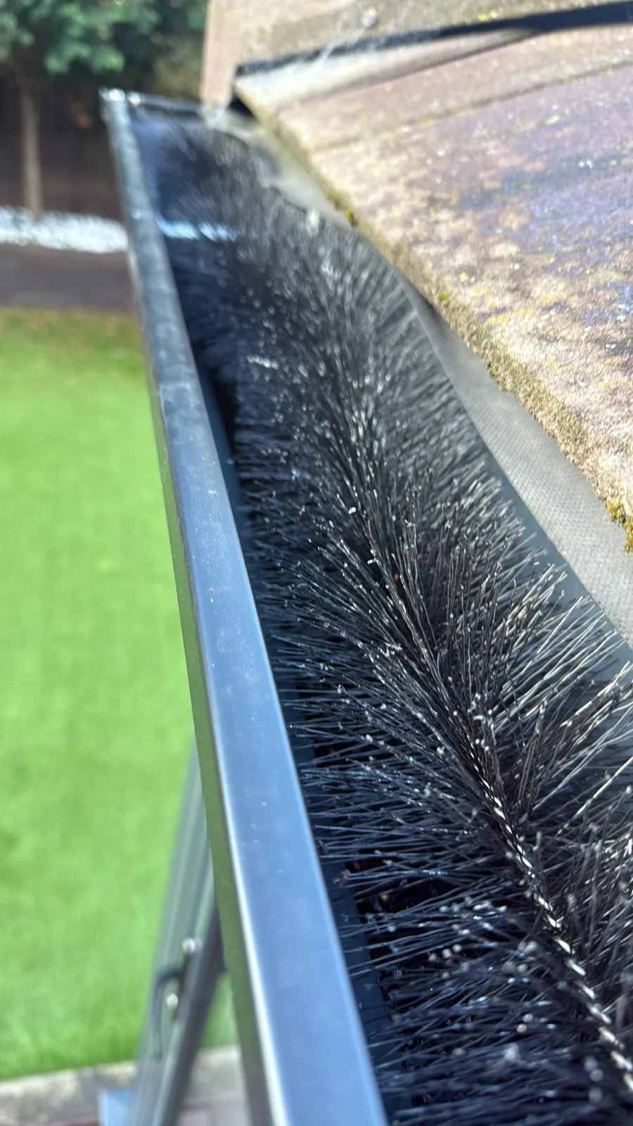 Hedgehog Gutter Brush fitted inside guttering.